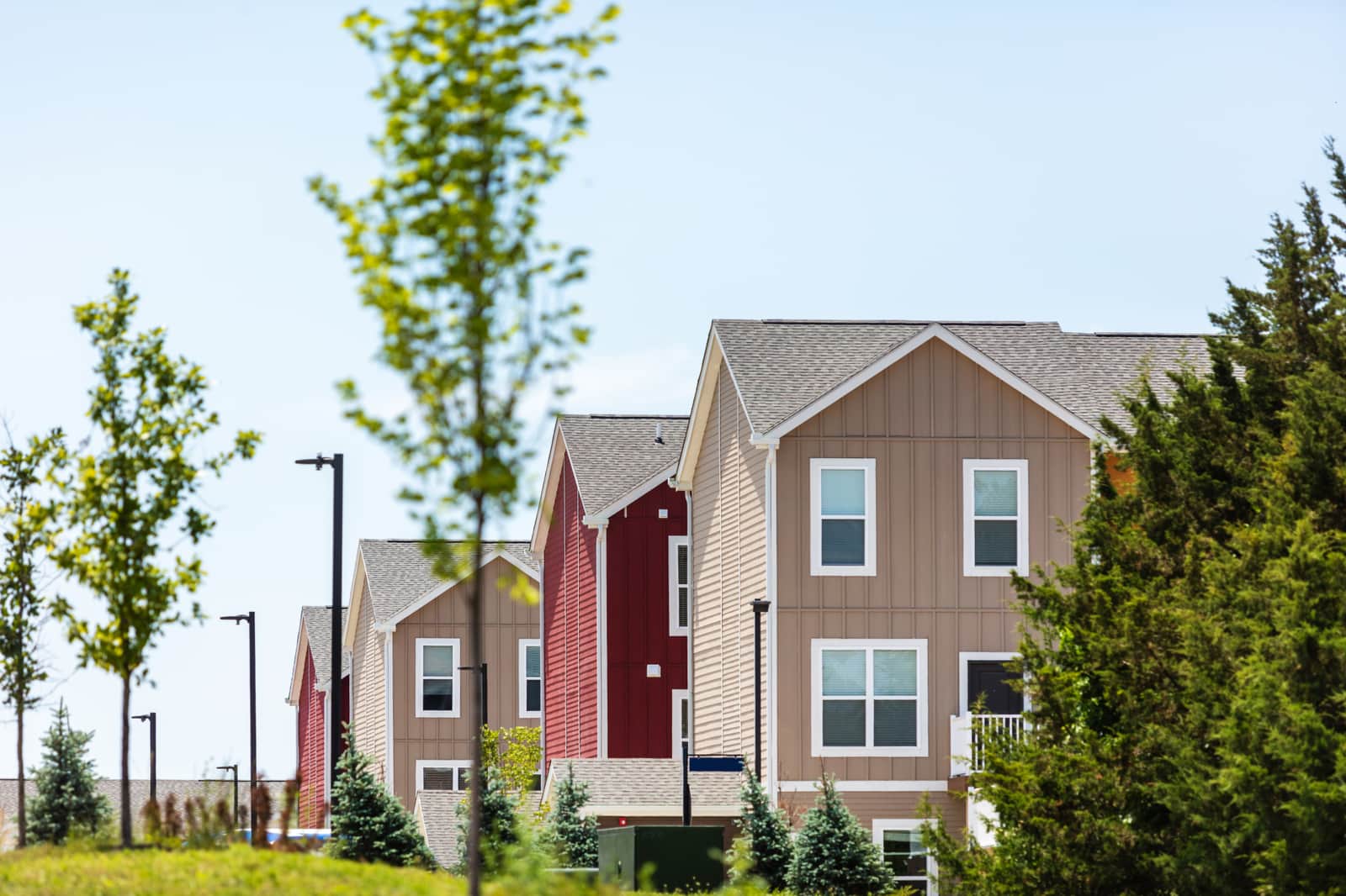 Row of Bright Multi-Colored Homes on a Sunny Summer Day